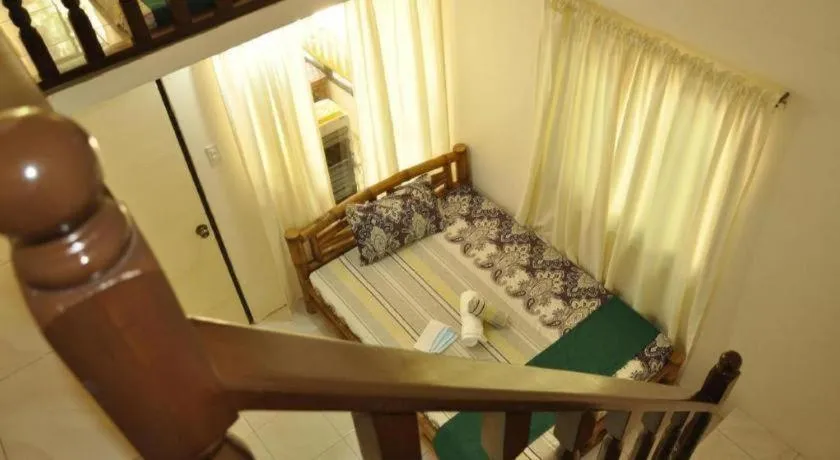 Bed in Paseo Verde Beach Resort