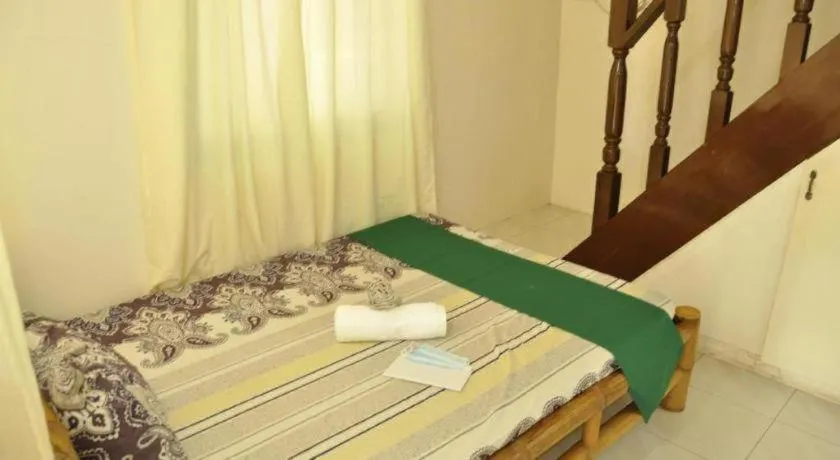 Bed in Paseo Verde Beach Resort