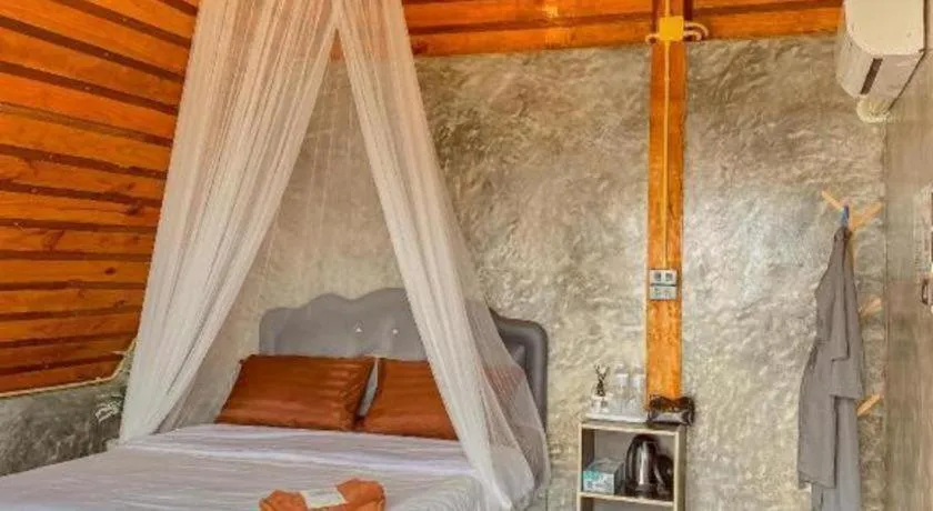 Bed in Rai Hyod Mei Resort