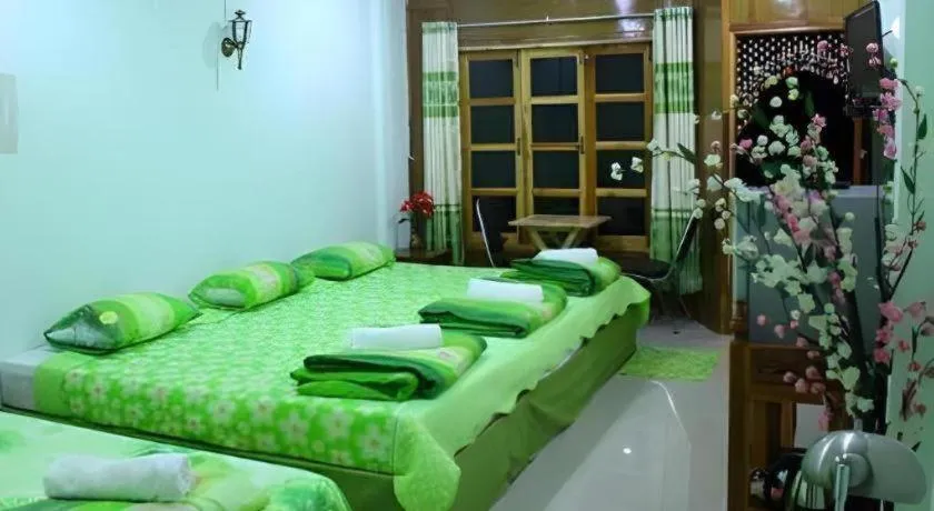 Bed in Chiangkhan Greenview Resort