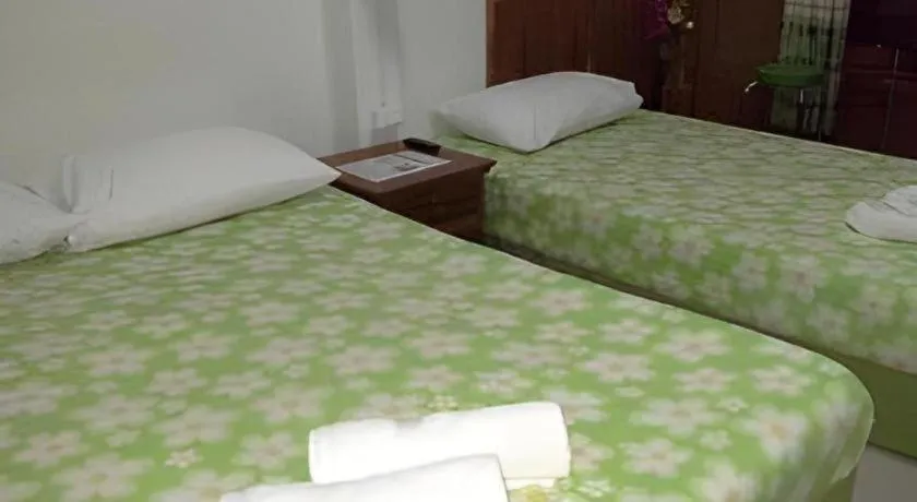 Bed in Chiangkhan Greenview Resort