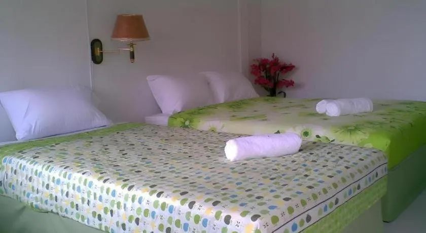 Bed in Chiangkhan Greenview Resort