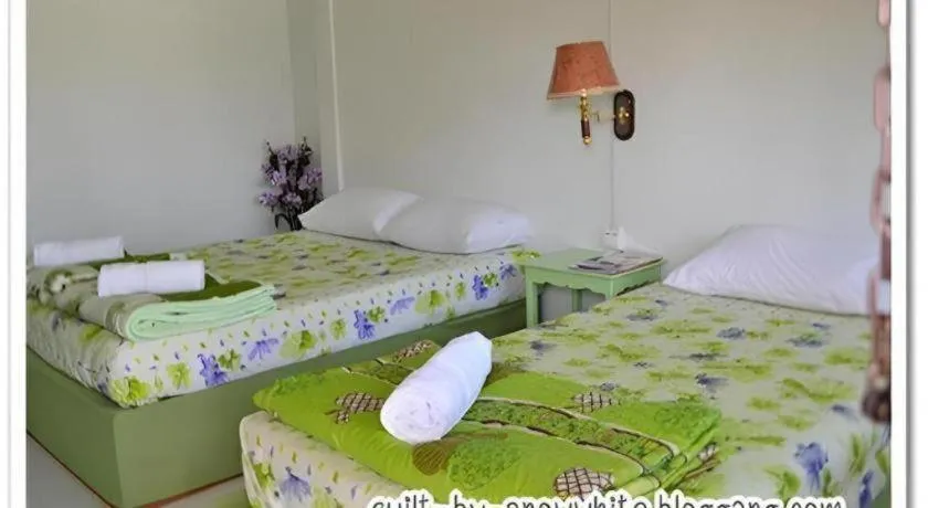 Bed in Chiangkhan Greenview Resort
