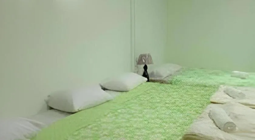 Bed in Chiangkhan Greenview Resort