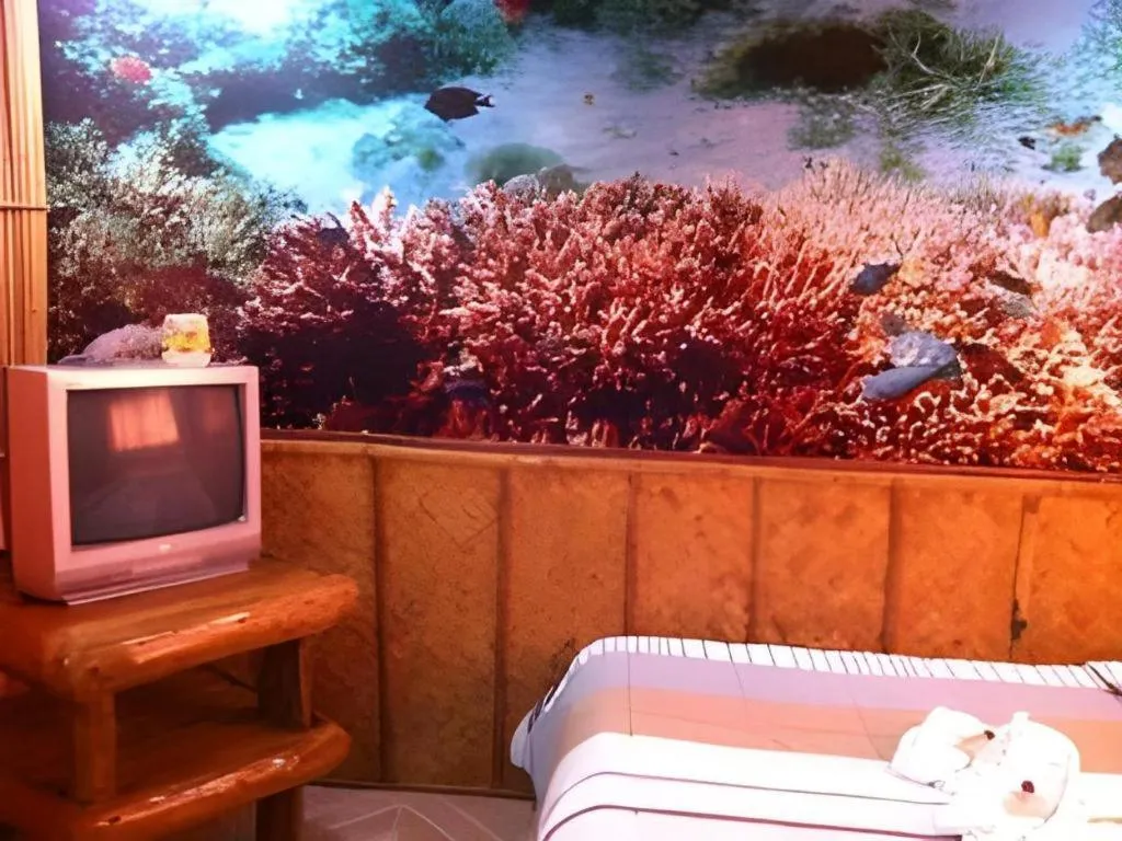 Bed in Anahaw Island View Resort