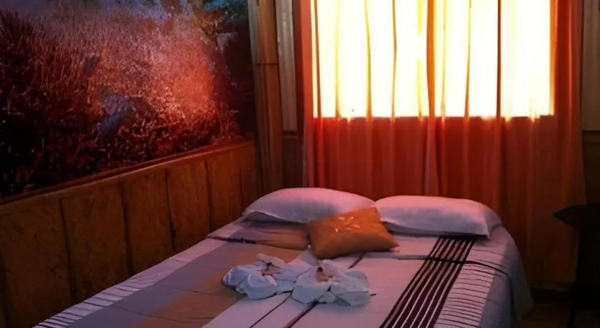 Bed in Anahaw Island View Resort