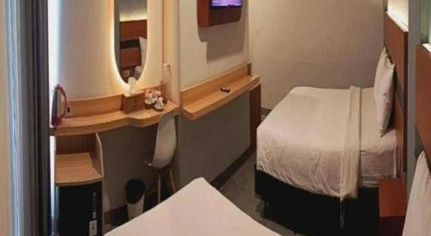 Bed in Queen Boutique Hotel Simpang Lima