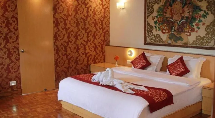 Bed in Hotel Tashi Delek