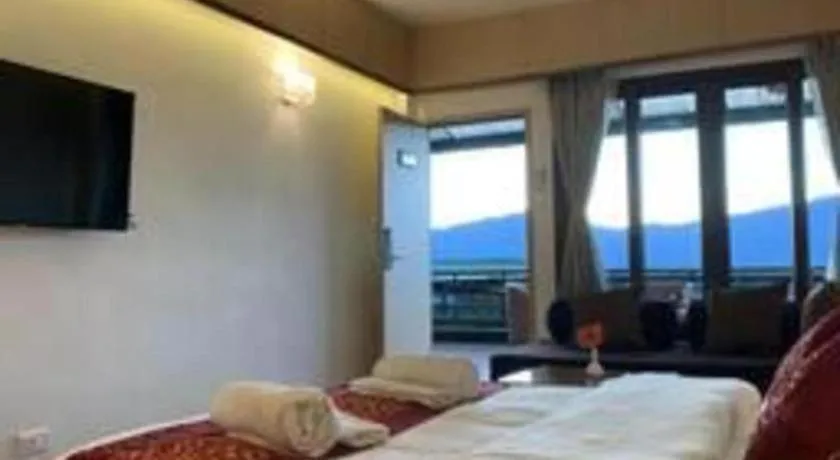 Bed in Hotel Tashi Delek