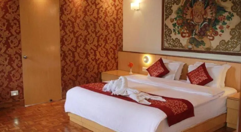 Bed in Hotel Tashi Delek