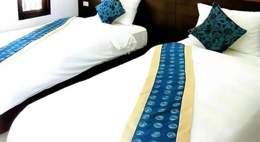 Bed in Dusai Tara Resort