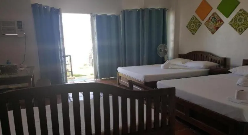 Bed in Blue Ocean Bohol Beachfront