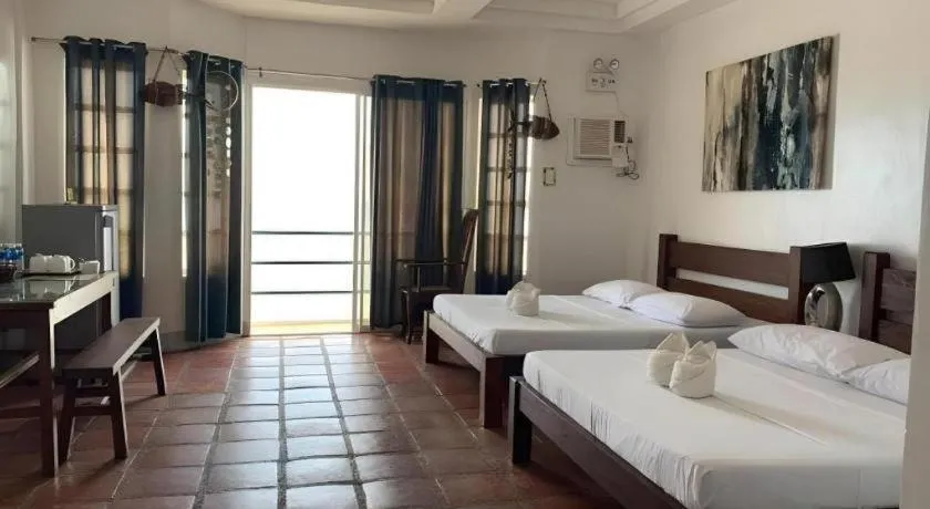 Bed in Blue Ocean Bohol Beachfront