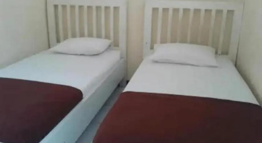Bed in Hotel Cendrawasih