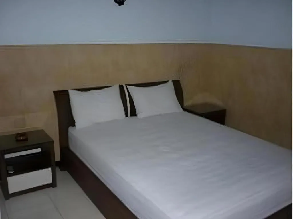 Bed in Hotel Cendrawasih
