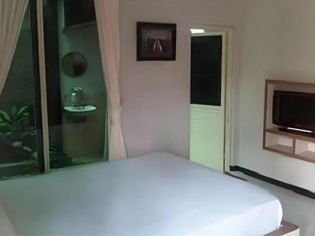 Bed in Hotel Cendrawasih