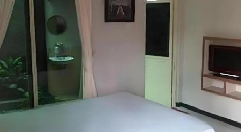 Bed in Hotel Cendrawasih