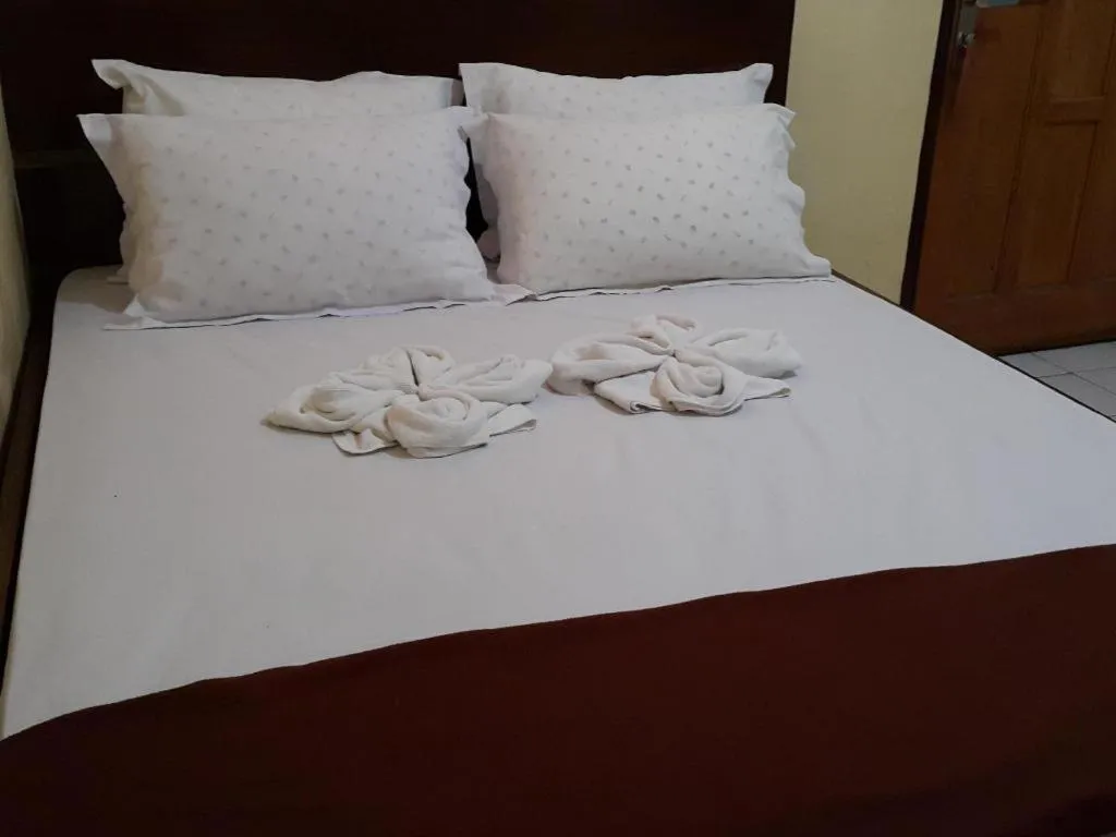 Bed in Hotel Cendrawasih