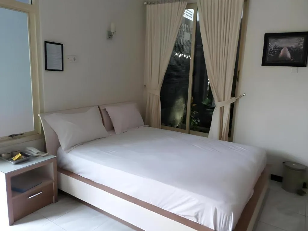 Bed in Hotel Cendrawasih