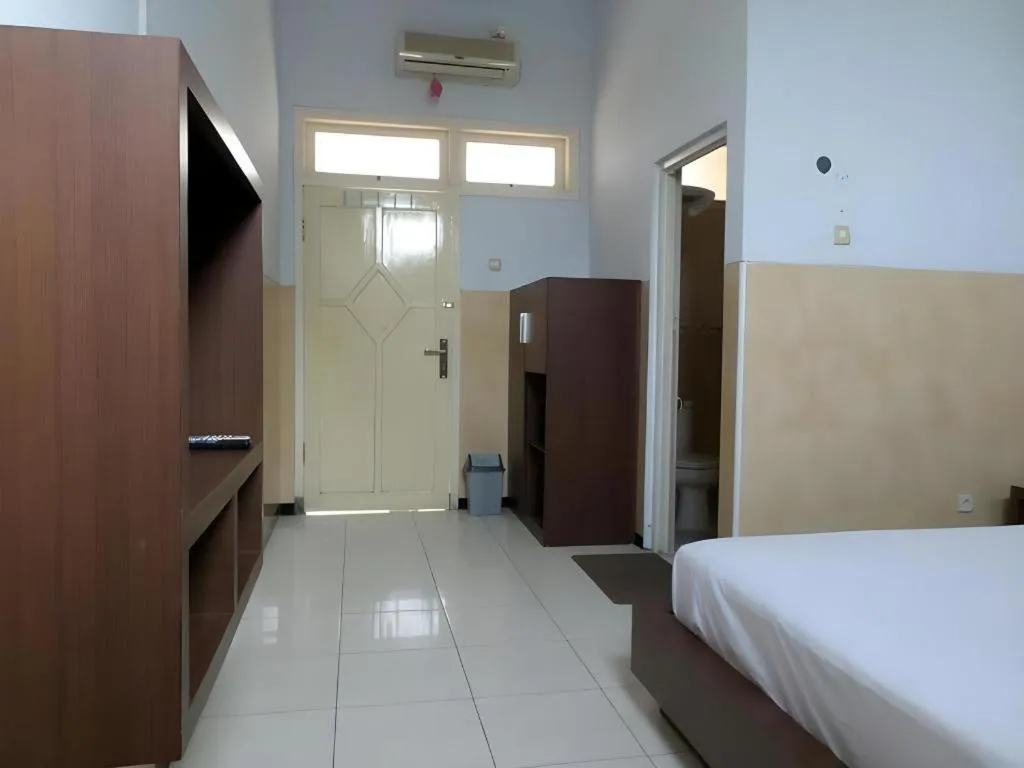 Bed in Hotel Cendrawasih