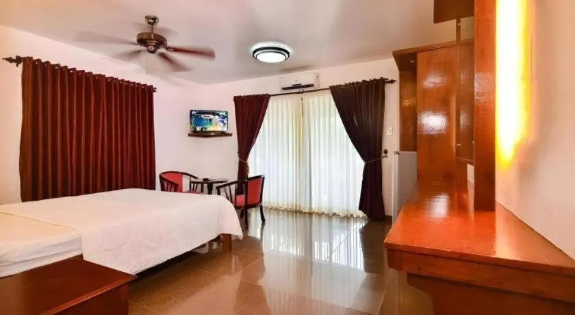 Bed in Steps Garden Resort