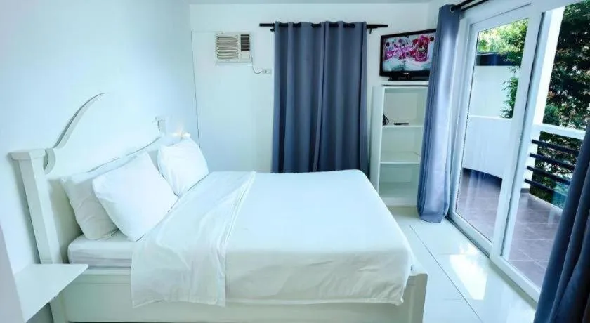 Bed in Steps Garden Resort