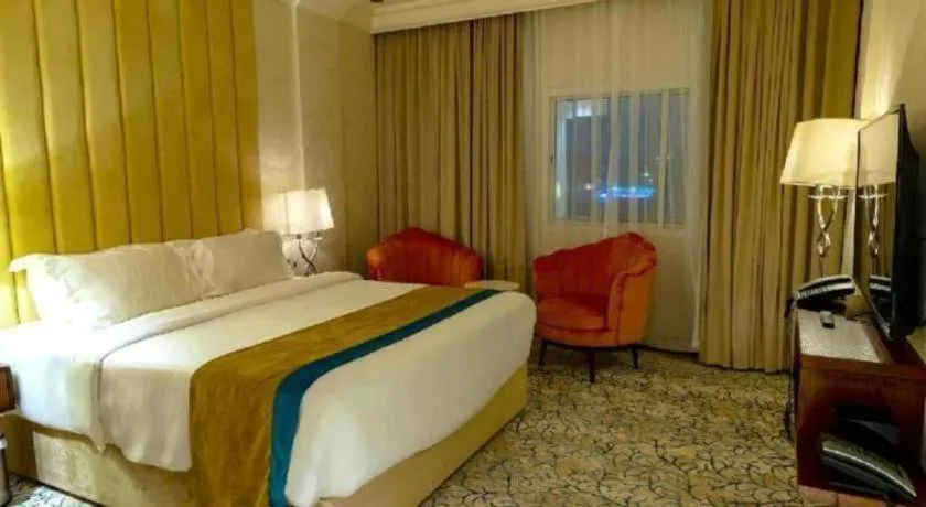 Bed in Gulf Pearls Hotel