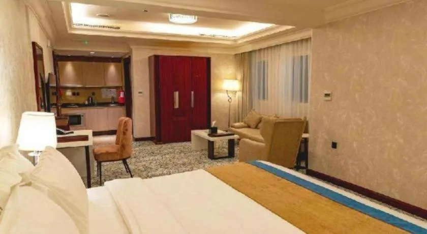 Bed in Gulf Pearls Hotel