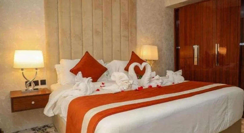 Bed in Gulf Pearls Hotel