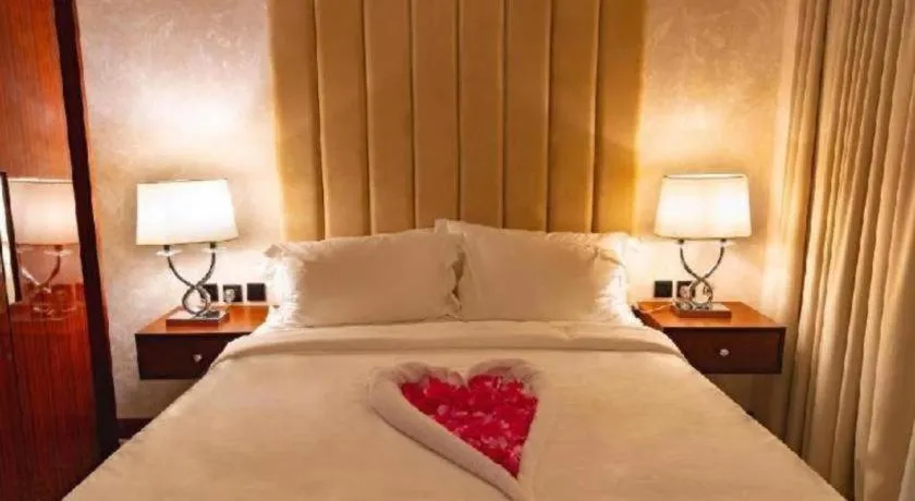 Bed in Gulf Pearls Hotel