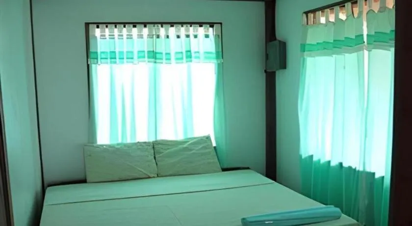 Bed in Mayas Native Garden Resort