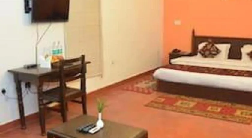 Bed in Pratiksha River Retreat