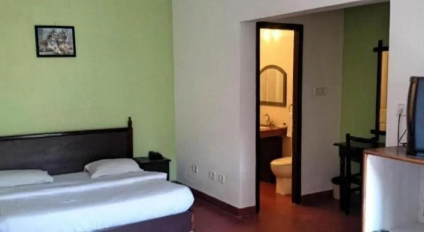 Bed in Pratiksha River Retreat