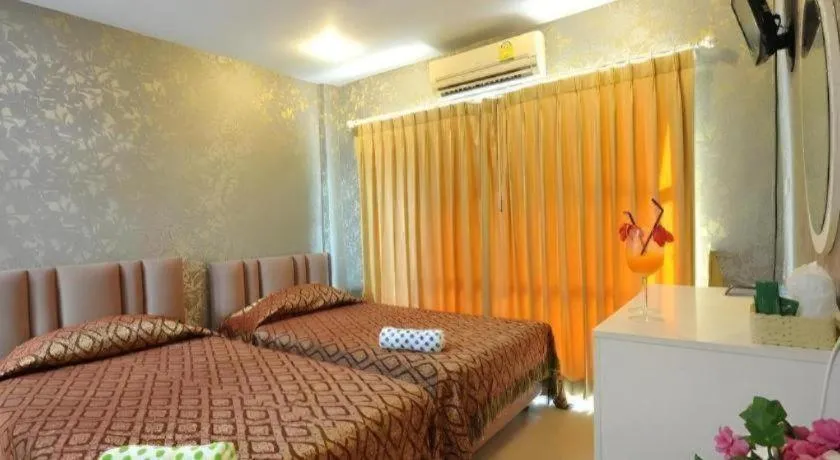 Bed in N Siri Resort & Hotel