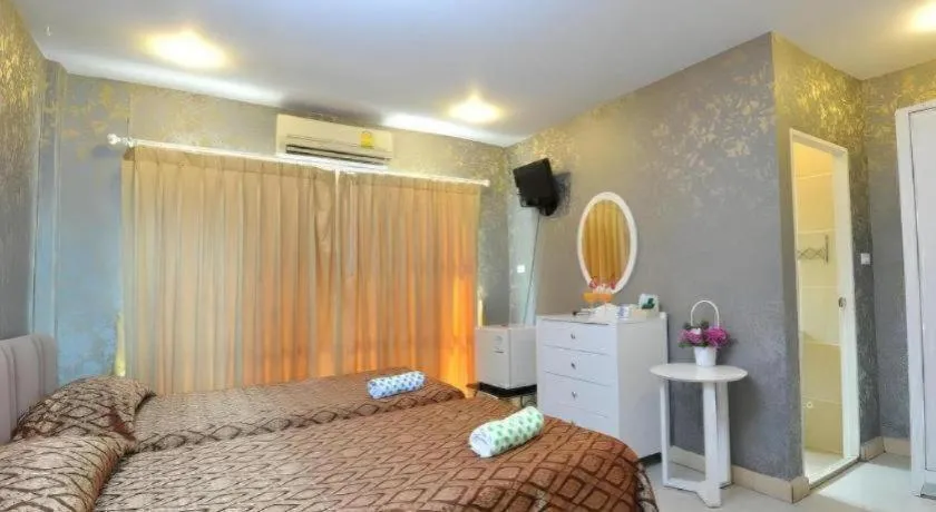 Bed in N Siri Resort & Hotel