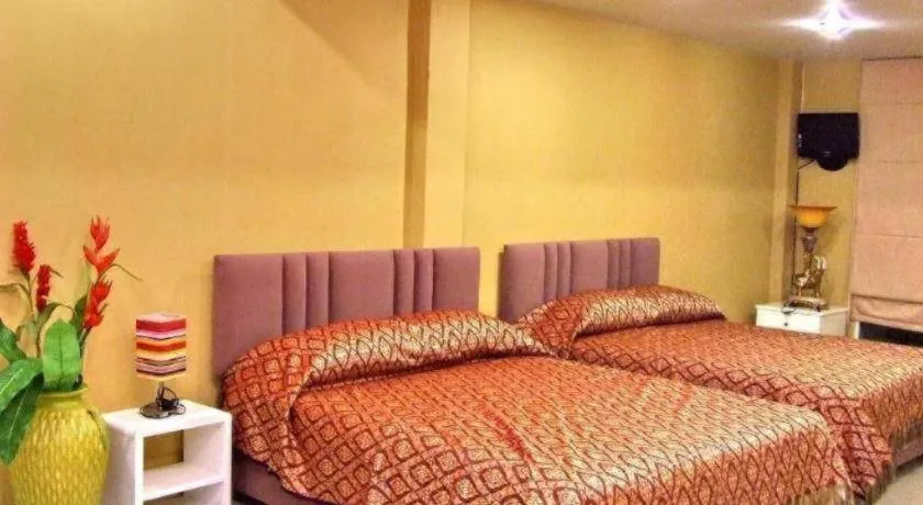 Bed in N Siri Resort & Hotel