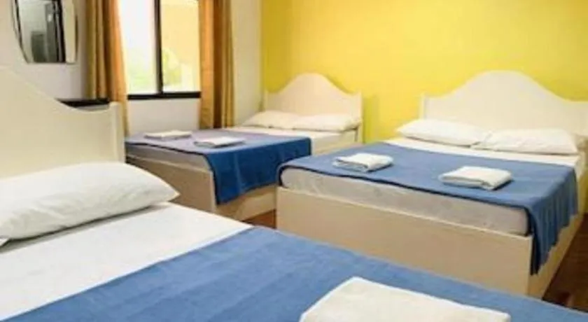 Bed in Villa Soledad Beach Resort