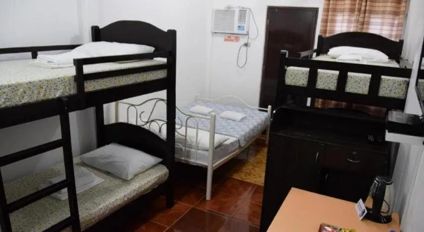 Bed in Villa Soledad Beach Resort