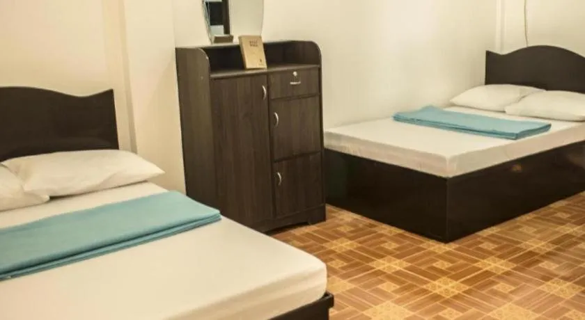 Bed in Villa Soledad Beach Resort