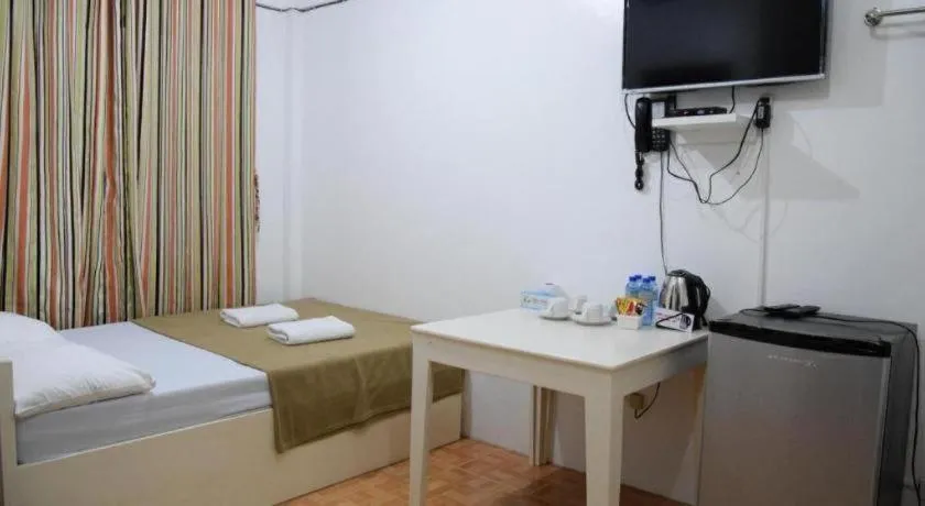 Bed in Villa Soledad Beach Resort