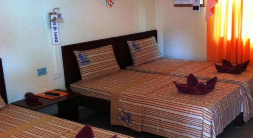 Bed in Raymen Beach Resort