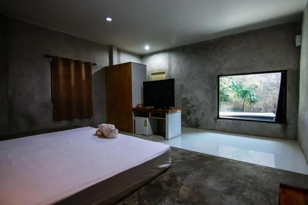 Bed in Baan Pan Din Resort