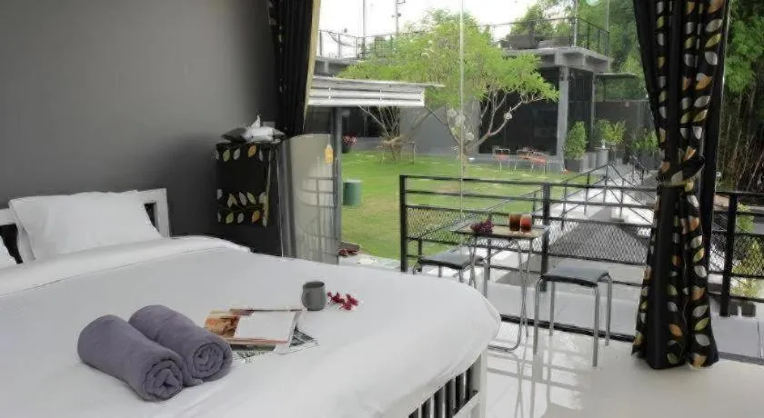 Bed in Rimnamphotharam Resort