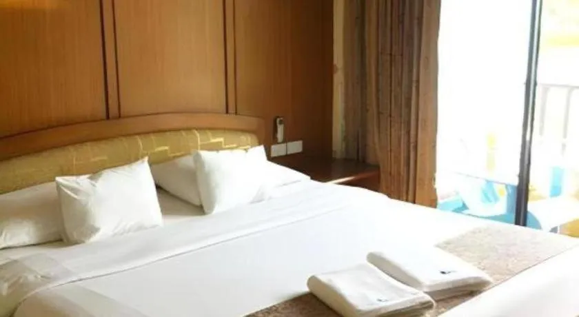 Bed in La Playa Boutique Resort