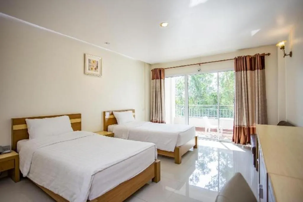 Bed in Zen Garden Resort