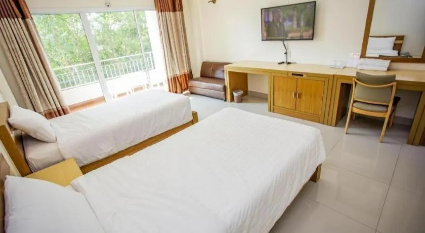 Bed in Zen Garden Resort