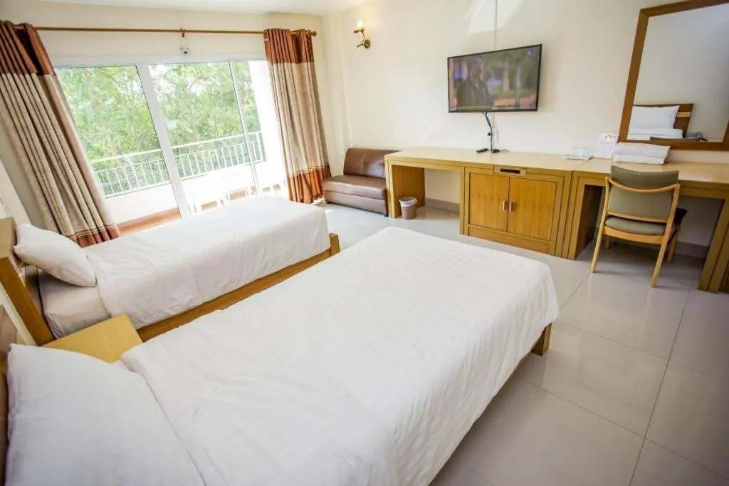 Bed in Zen Garden Resort