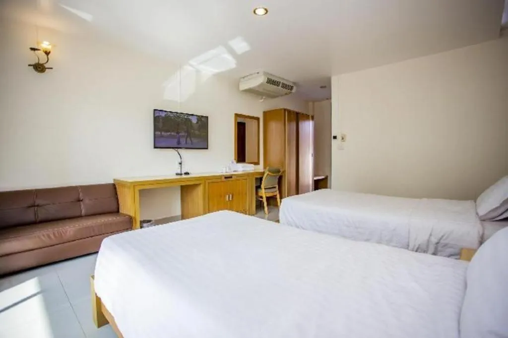 Bed in Zen Garden Resort