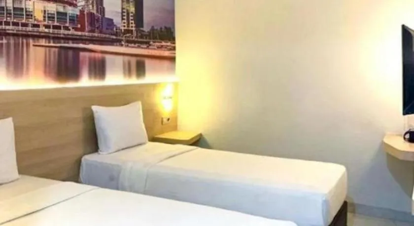 Bed in Cordex Hotel Medan