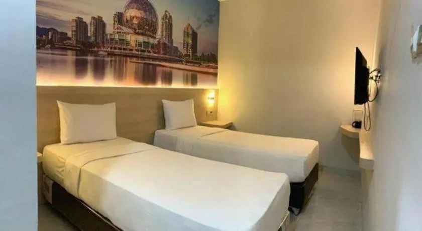 Bed in Cordex Hotel Medan